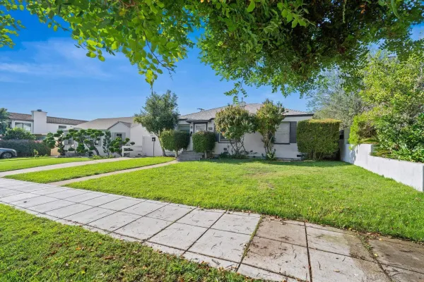 a view of a backyard with a garden
