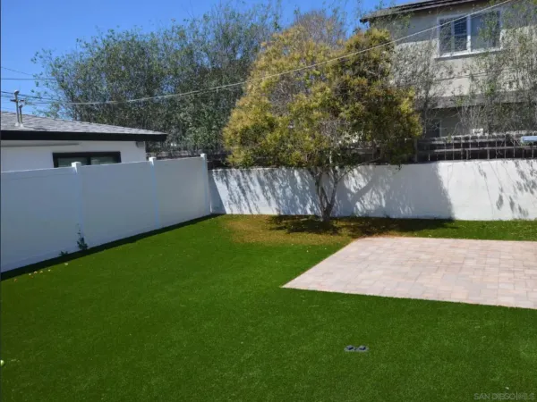 a view of a house with a big yard