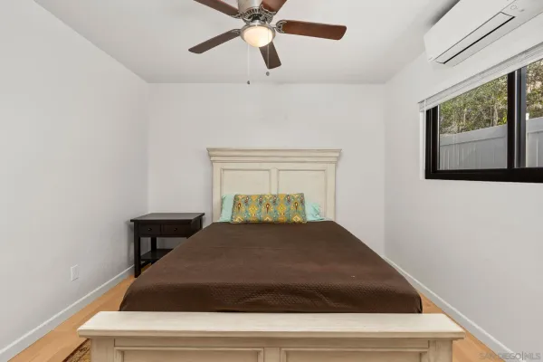 a kitchen with stainless steel appliances granite countertop a refrigerator a sink a stove and island