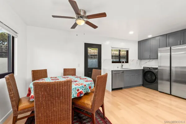 a living room with furniture and a rug