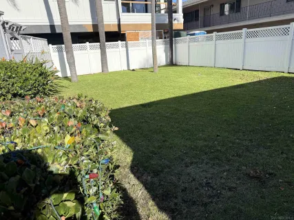 a view of yard with swimming pool