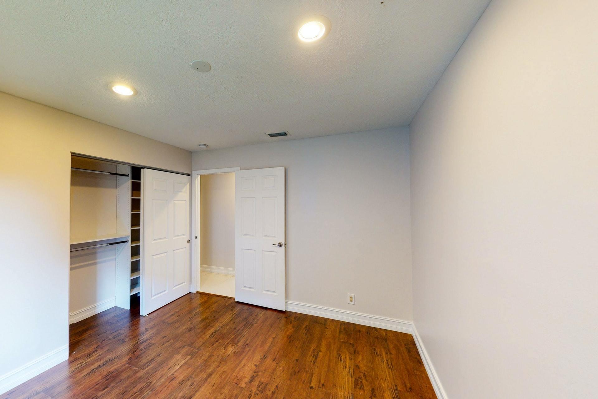 1339 Southwest 3rd Street Boca Raton, FL 33486 - Photo 30 of 56 a view of empty room with wooden floor