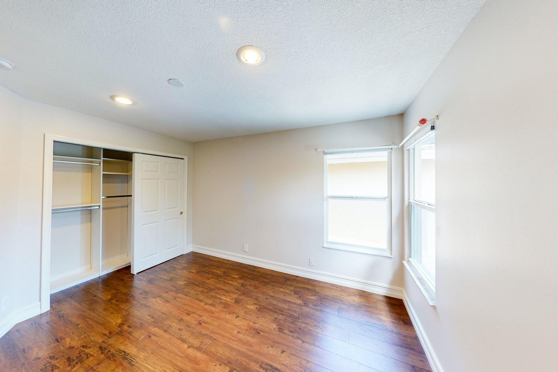 1339 Southwest 3rd Street Boca Raton, FL 33486 - Photo 35 of 56 an empty room with wooden floor and window