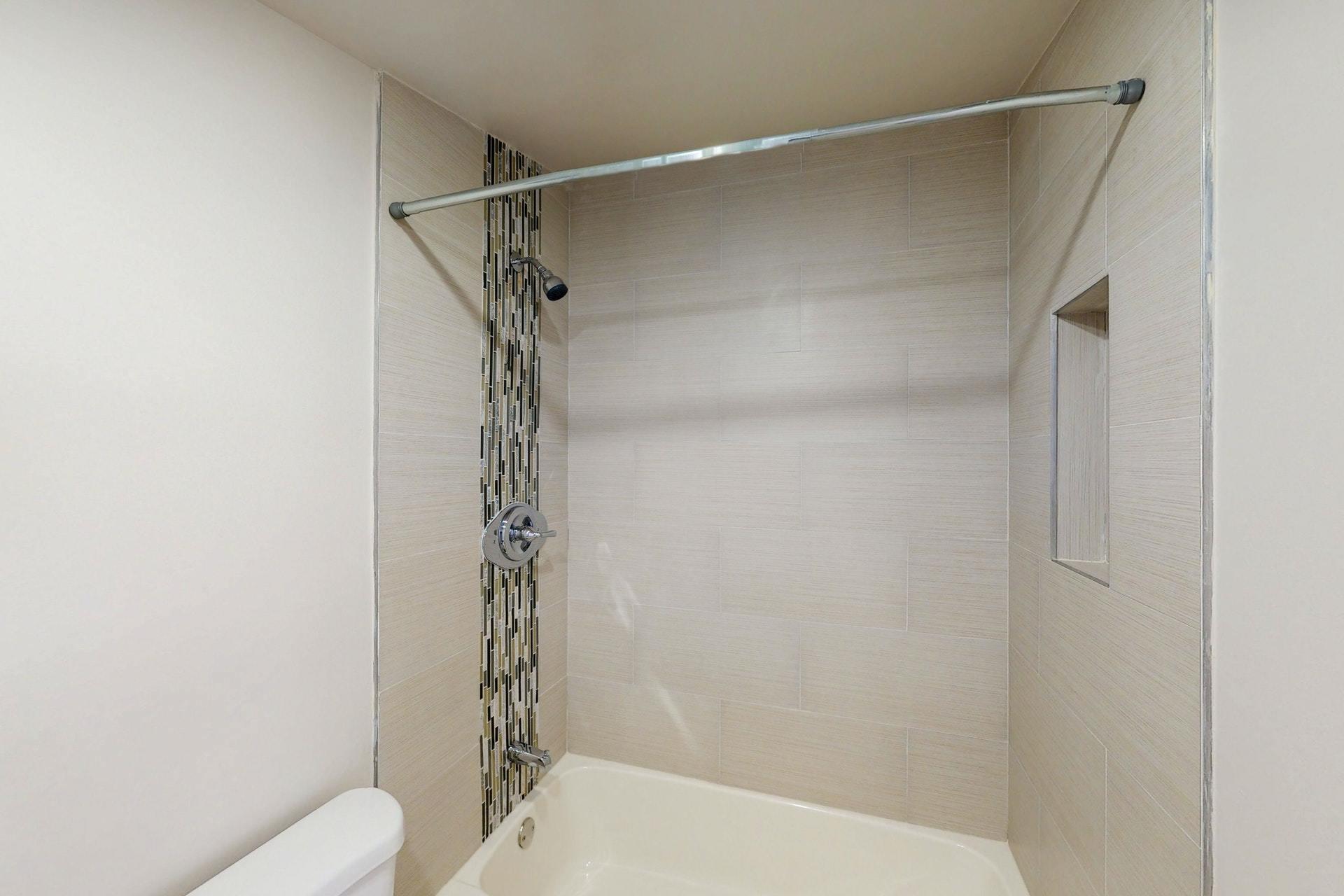 1339 Southwest 3rd Street Boca Raton, FL 33486 - Photo 43 of 56 a bathroom with a shower and a toilet