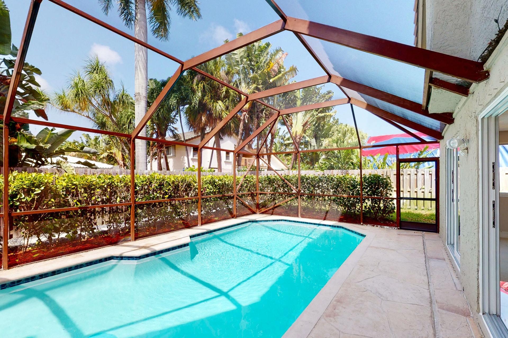 1339 Southwest 3rd Street Boca Raton, FL 33486 - Photo 49 of 56 a view of swimming pool with a yard