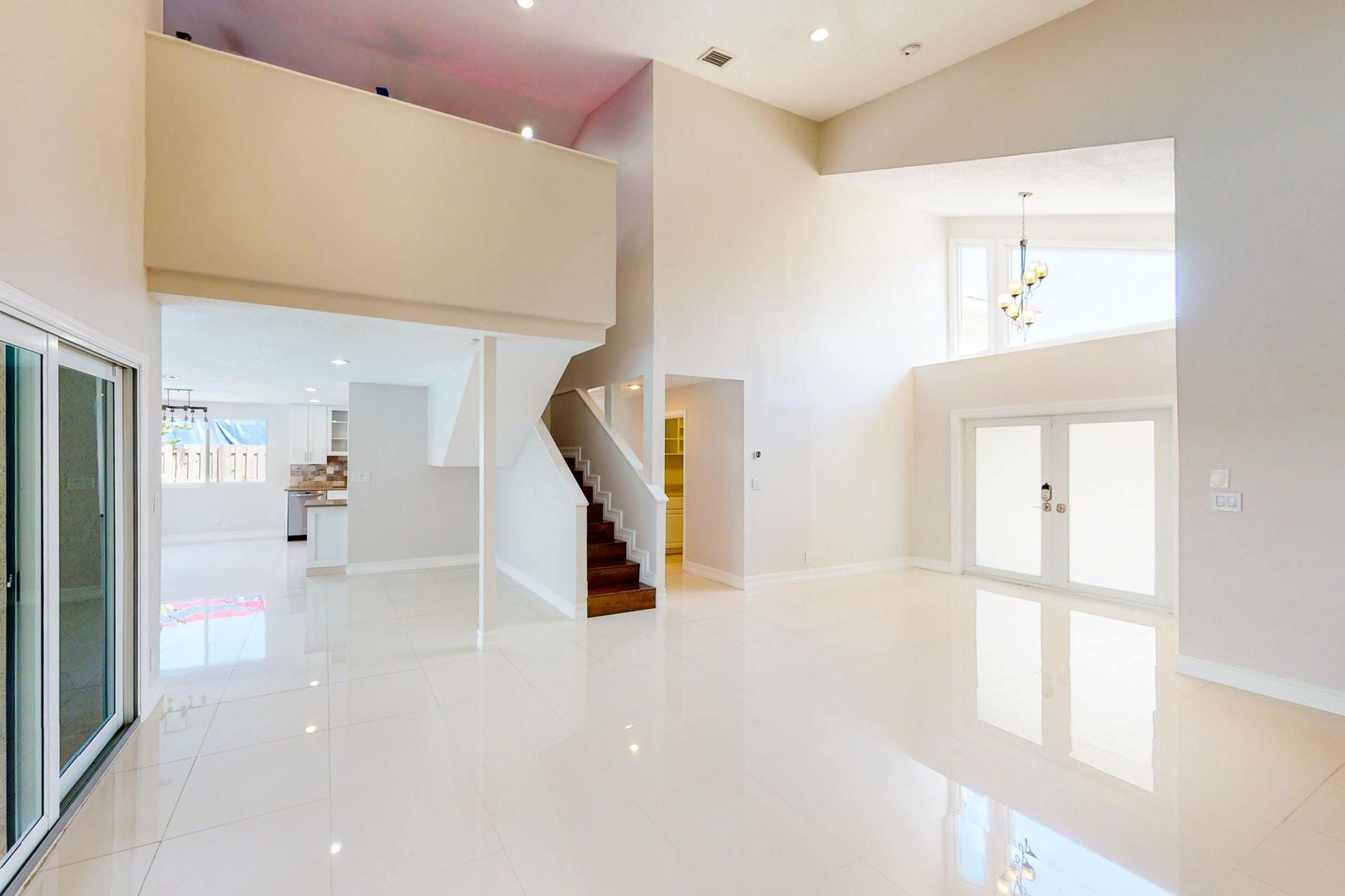 1339 Southwest 3rd Street Boca Raton, FL 33486 - Photo 9 of 56 a view of a hallway with windows and entryway