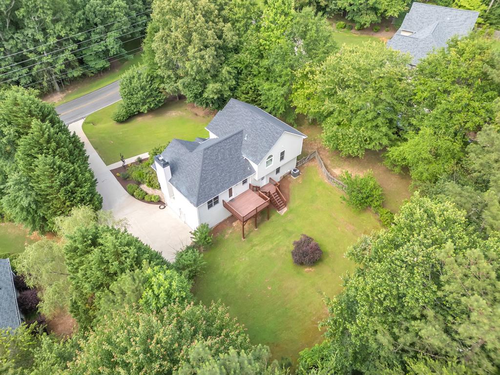 750 Cable Road Waleska, GA 30183 - Photo 2 of 33 an aerial view of a house with swimming pool and garden view