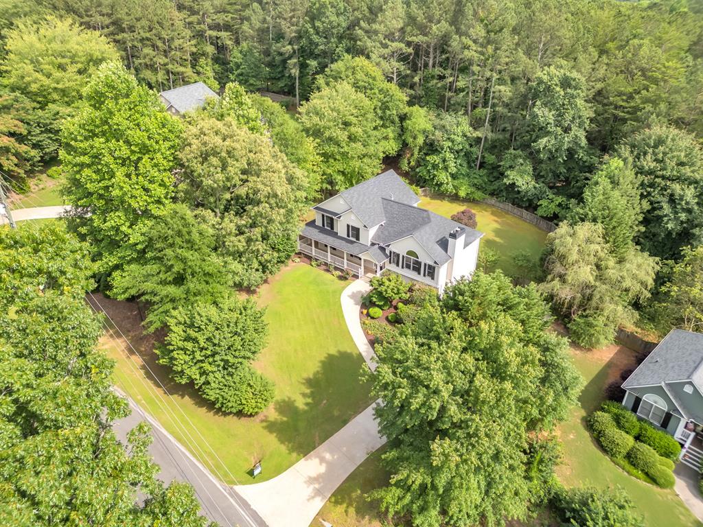 750 Cable Road Waleska, GA 30183 - Photo 27 of 33 an aerial view of a house with a garden