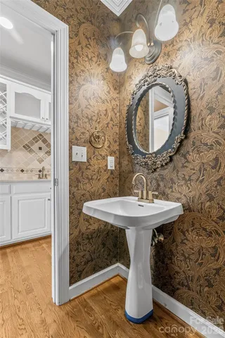 a view of a big room with windows and wardrobe