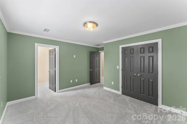 a bathroom with a sink vanity and a mirror