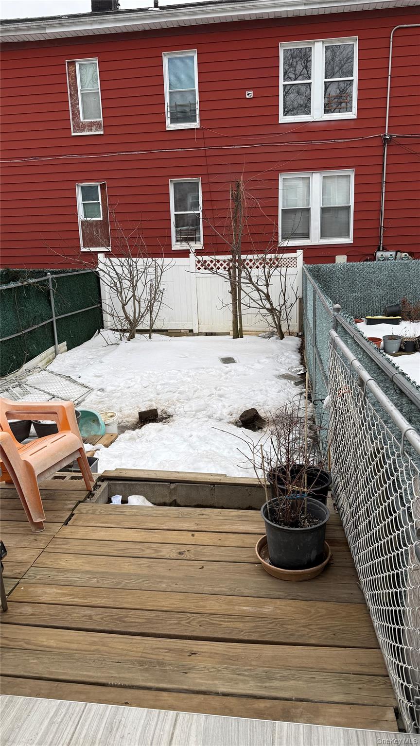 88-10 78th Street Queens, NY 11421 - Photo 19 of 19 a view of a house with a yard