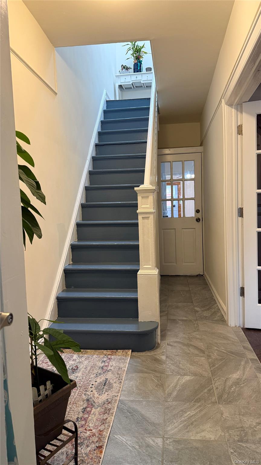88-10 78th Street Queens, NY 11421 - Photo 3 of 19 a view of entryway and hall