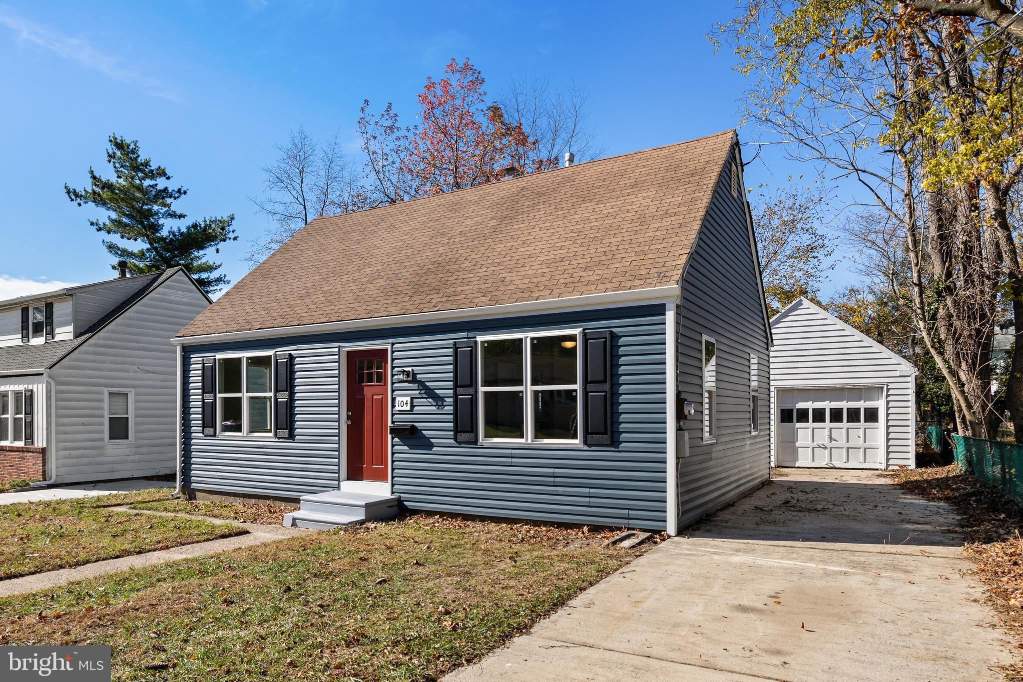 a house with trees in front of it