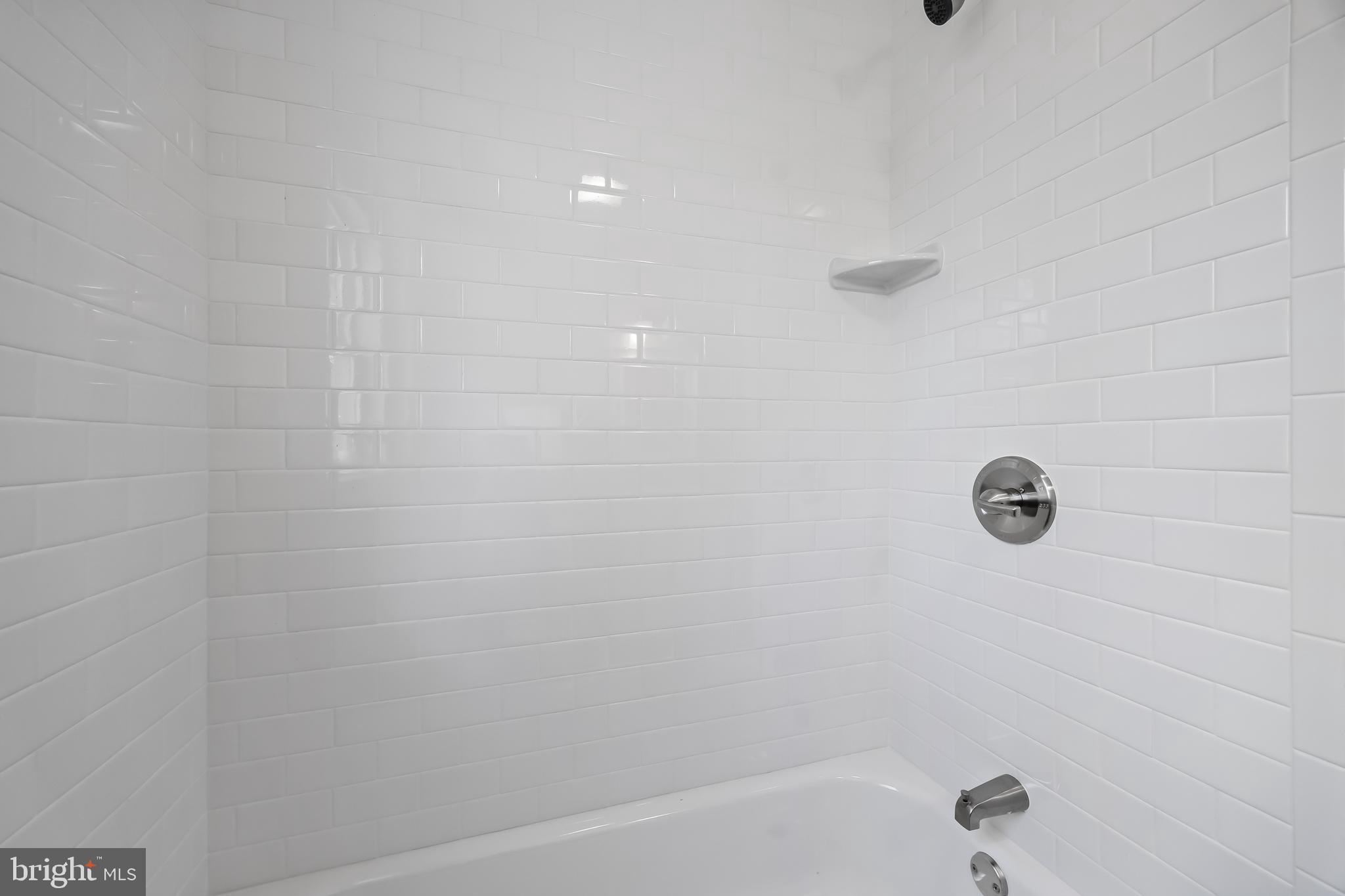 104 West Park Avenue Lindenwold, NJ 08021 - Photo 16 of 26 a bathroom with a shower