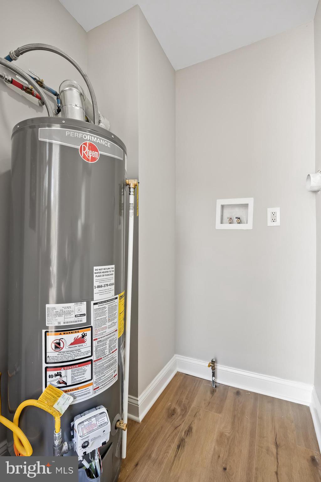104 West Park Avenue Lindenwold, NJ 08021 - Photo 22 of 26 a view of storage and utility room with wooden floor
