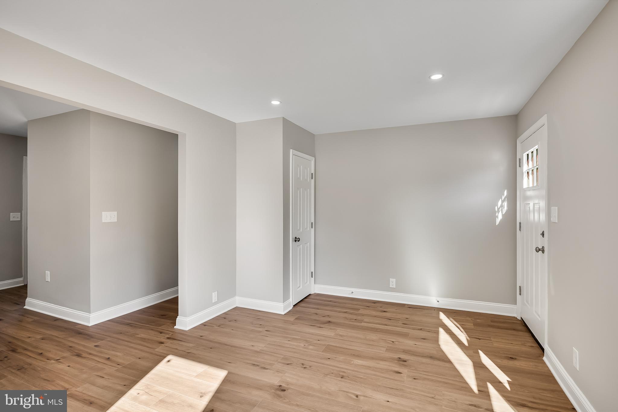 104 West Park Avenue Lindenwold, NJ 08021 - Photo 8 of 26 a view of an empty room with wooden floor