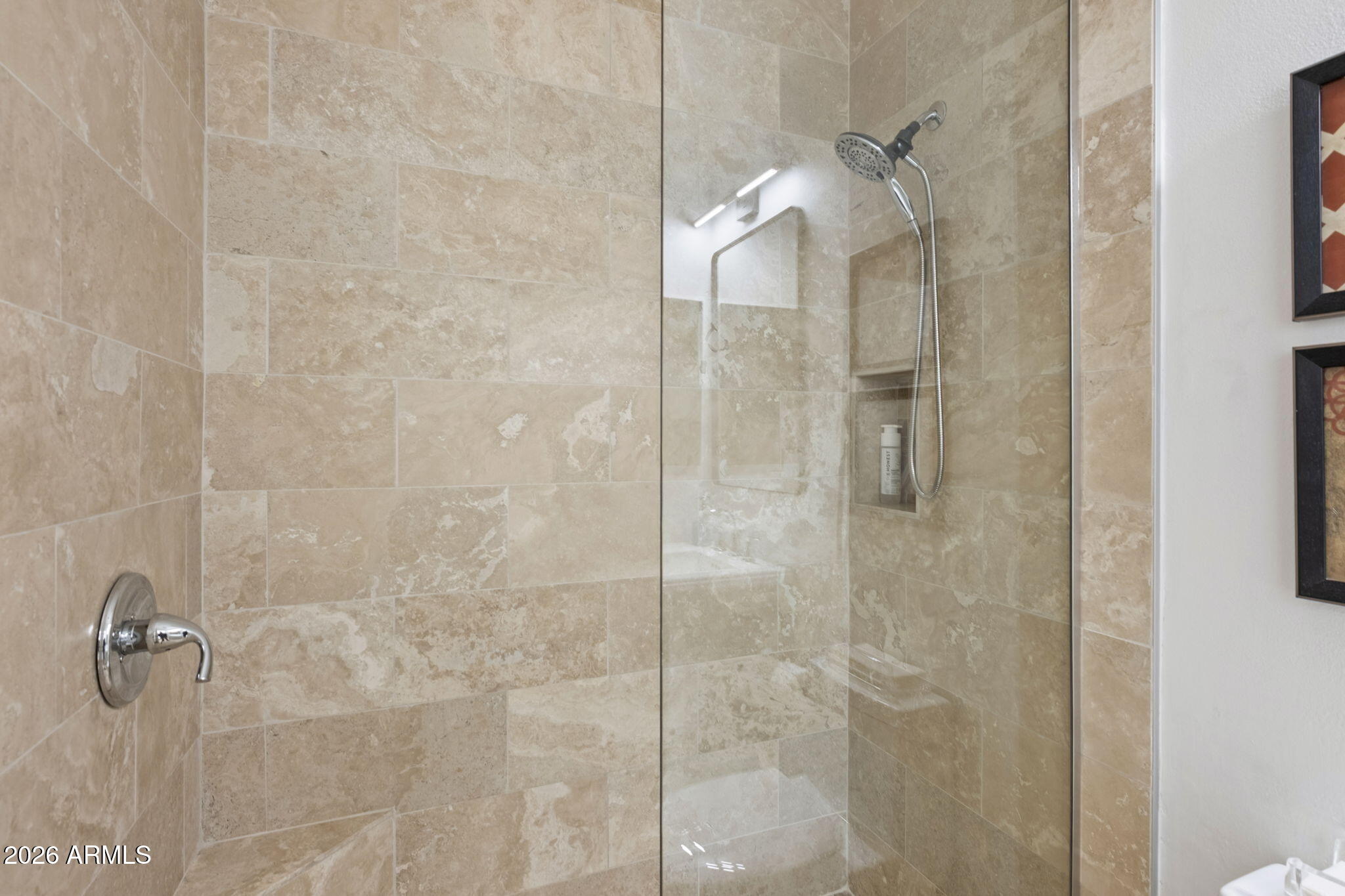 8270 North Hayden Road, Unit 1036 Scottsdale, AZ 85258 - Photo 14 of 20 a bathroom with a glass shower door