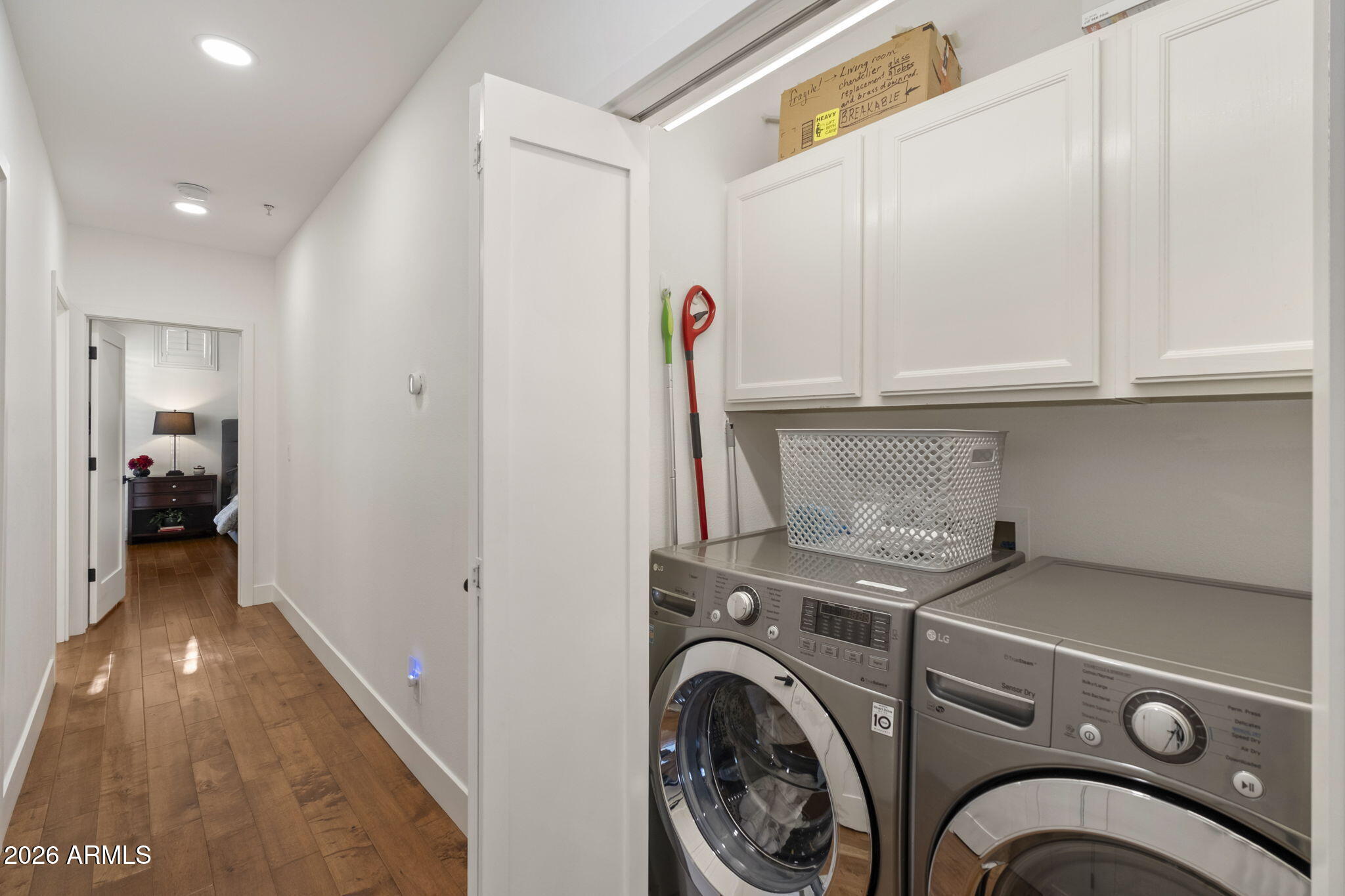 8270 North Hayden Road, Unit 1036 Scottsdale, AZ 85258 - Photo 16 of 20 a view of entryway with washer and dryer
