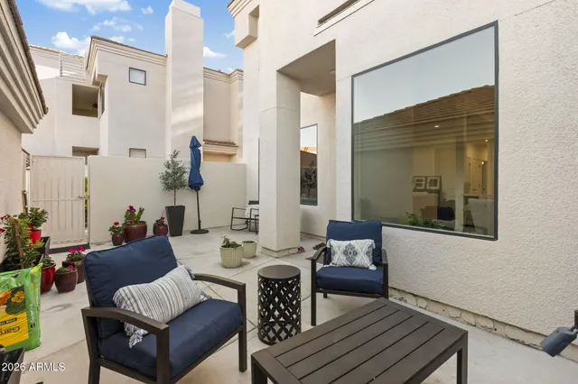 a view of a livingroom with furniture and furniture