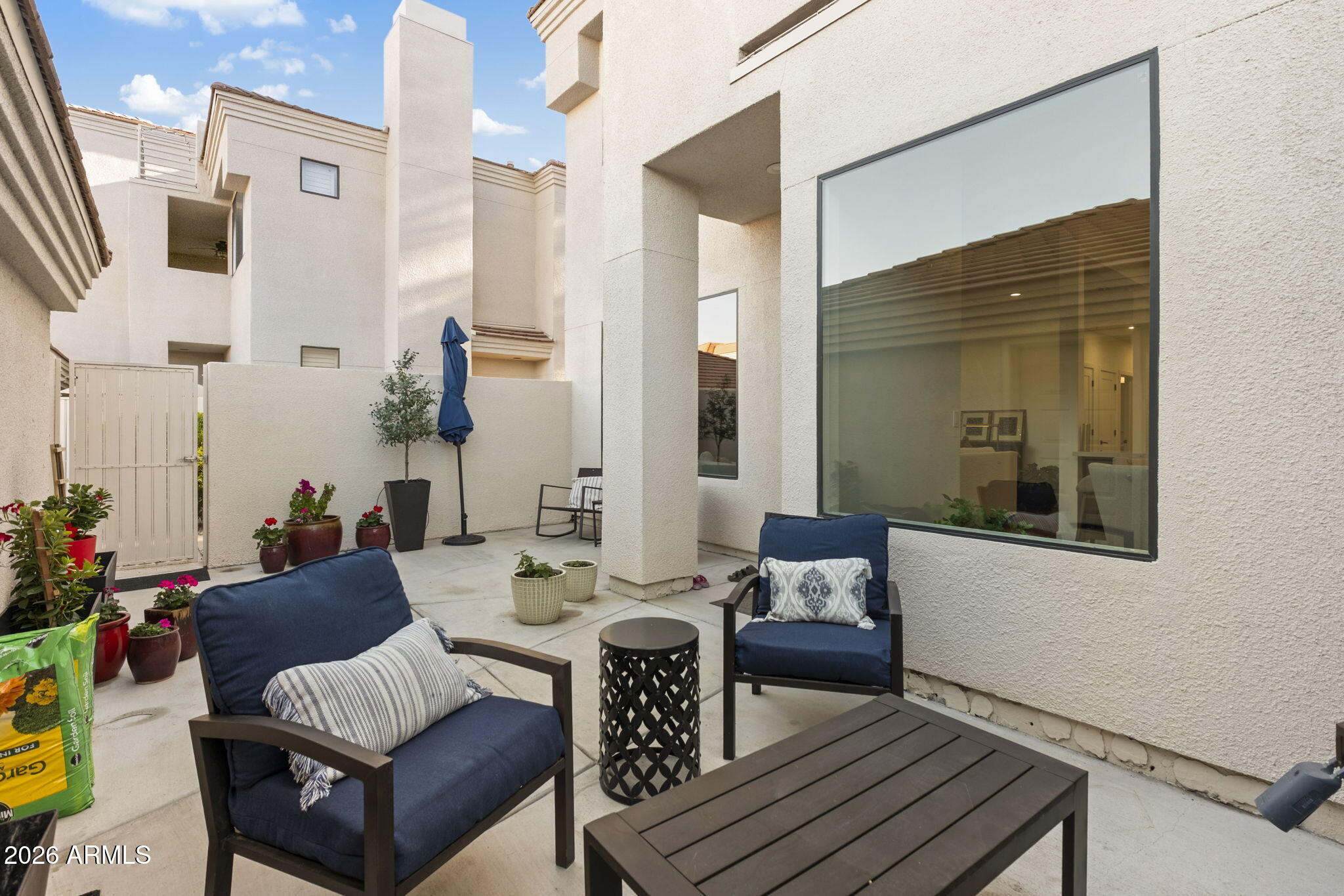 8270 North Hayden Road, Unit 1036 Scottsdale, AZ 85258 - Photo 18 of 20 a view of a livingroom with furniture and furniture