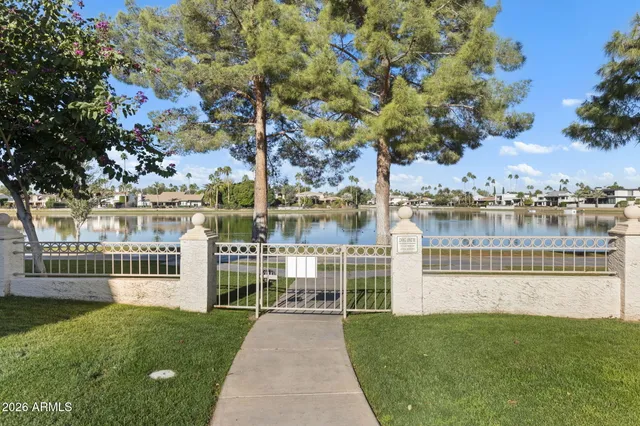 a view of a garden with a lake view