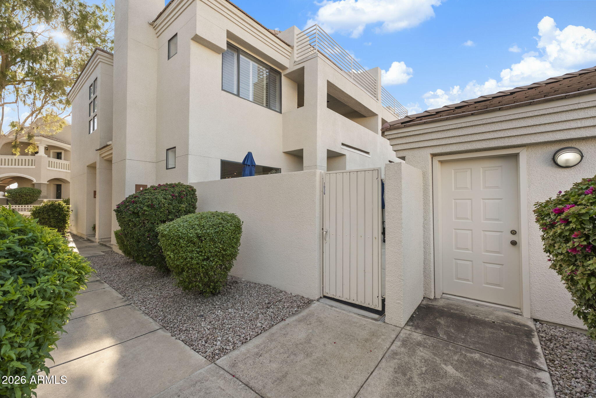 8270 North Hayden Road, Unit 1036 Scottsdale, AZ 85258 - Photo 2 of 20 a view of a back yard of the house