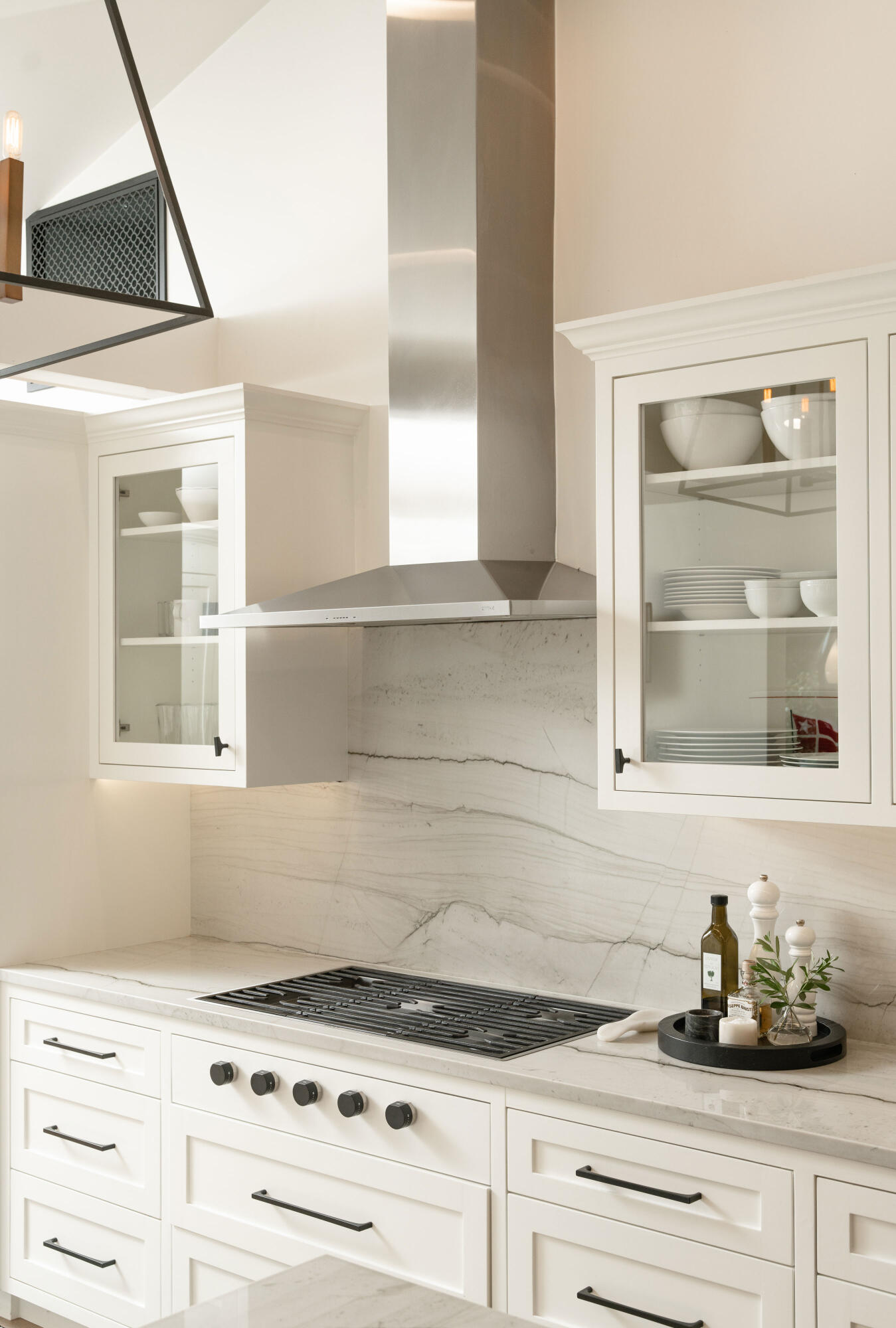 135 Pomar Lane Montecito, CA 93108 - Photo 11 of 29 a kitchen with granite countertop white cabinets and white appliances