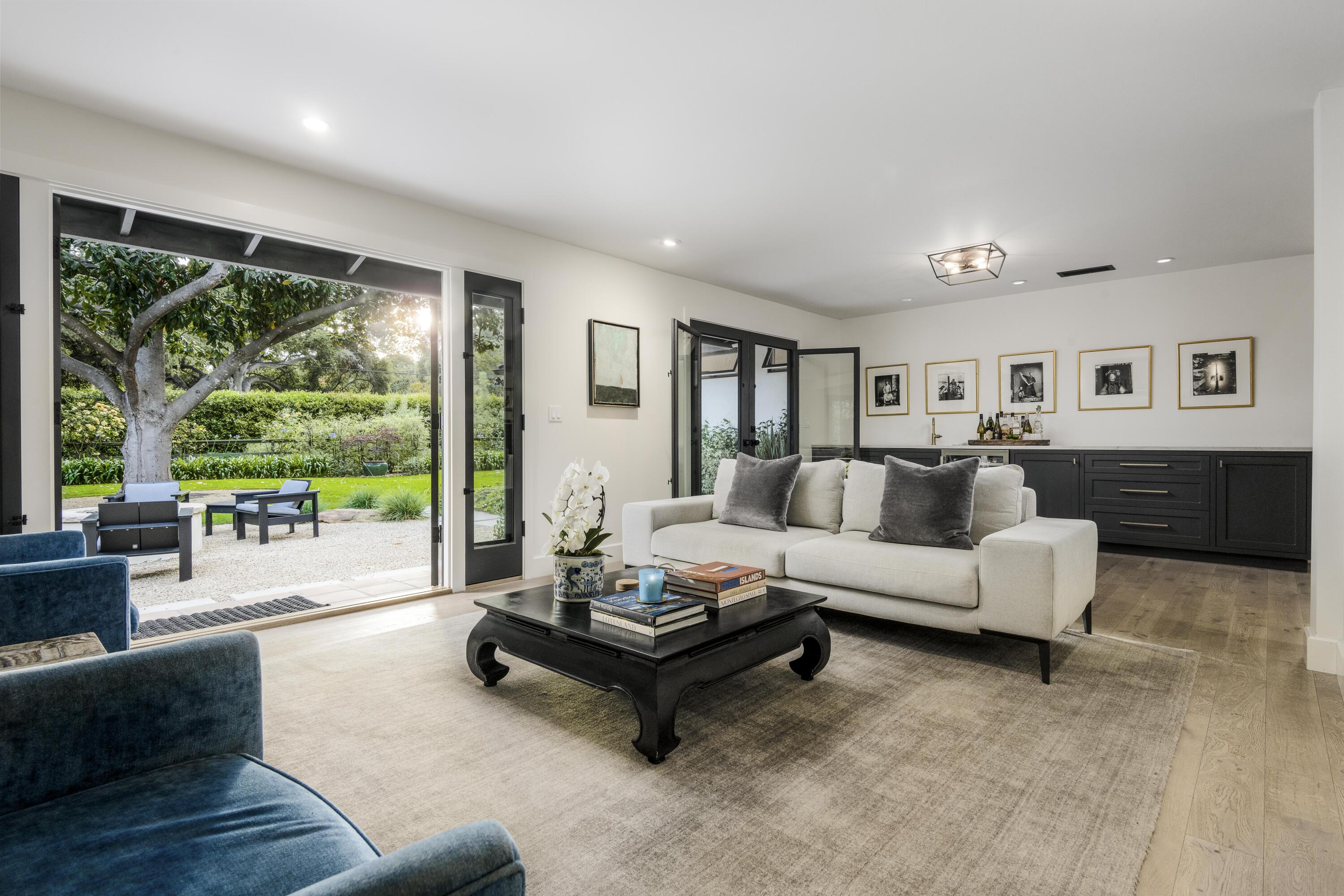 135 Pomar Lane Montecito, CA 93108 - Photo 13 of 29 a living room with furniture and a large window
