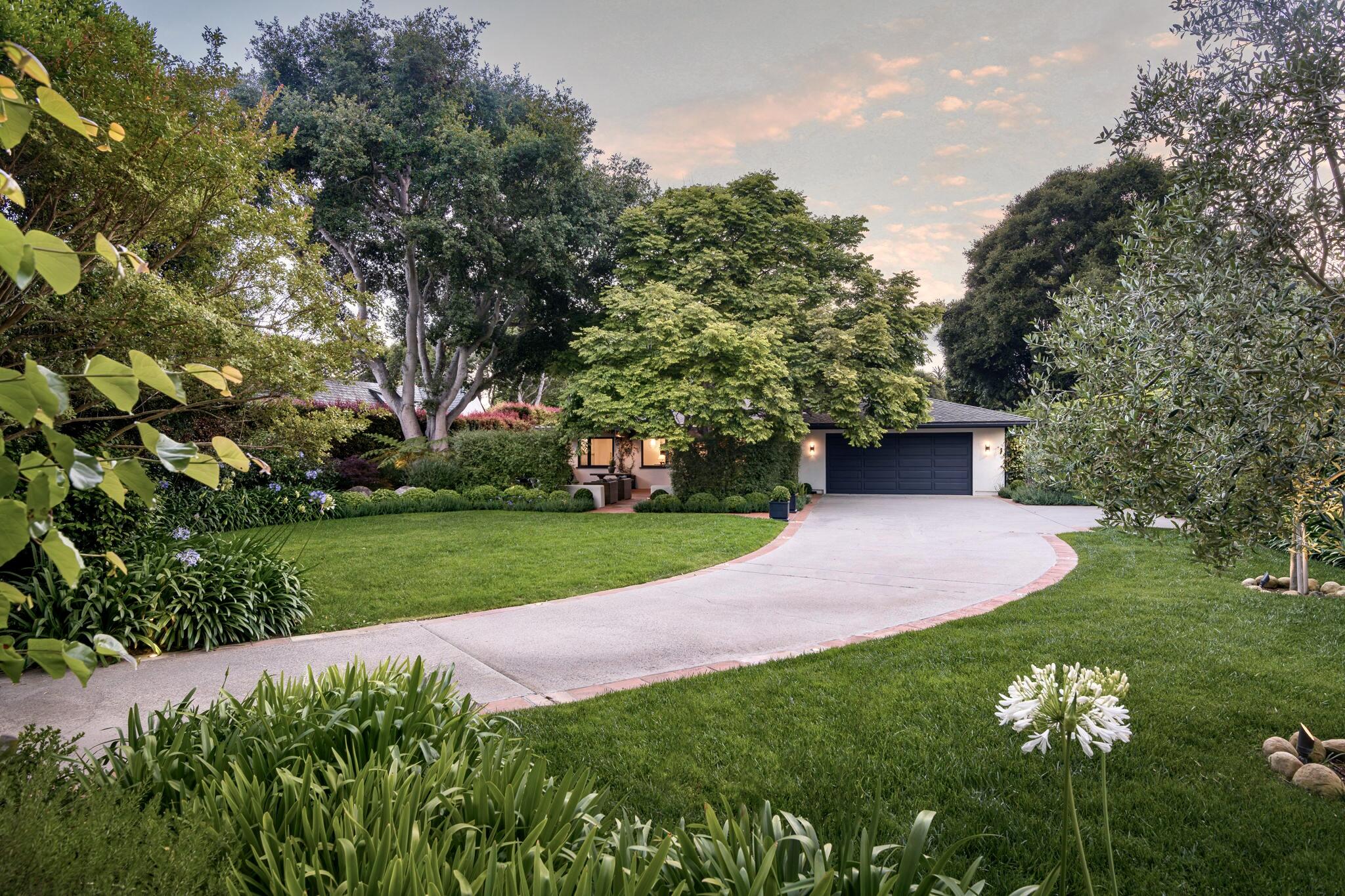 135 Pomar Lane Montecito, CA 93108 - Photo 2 of 29 a view of a house with a yard and tree s