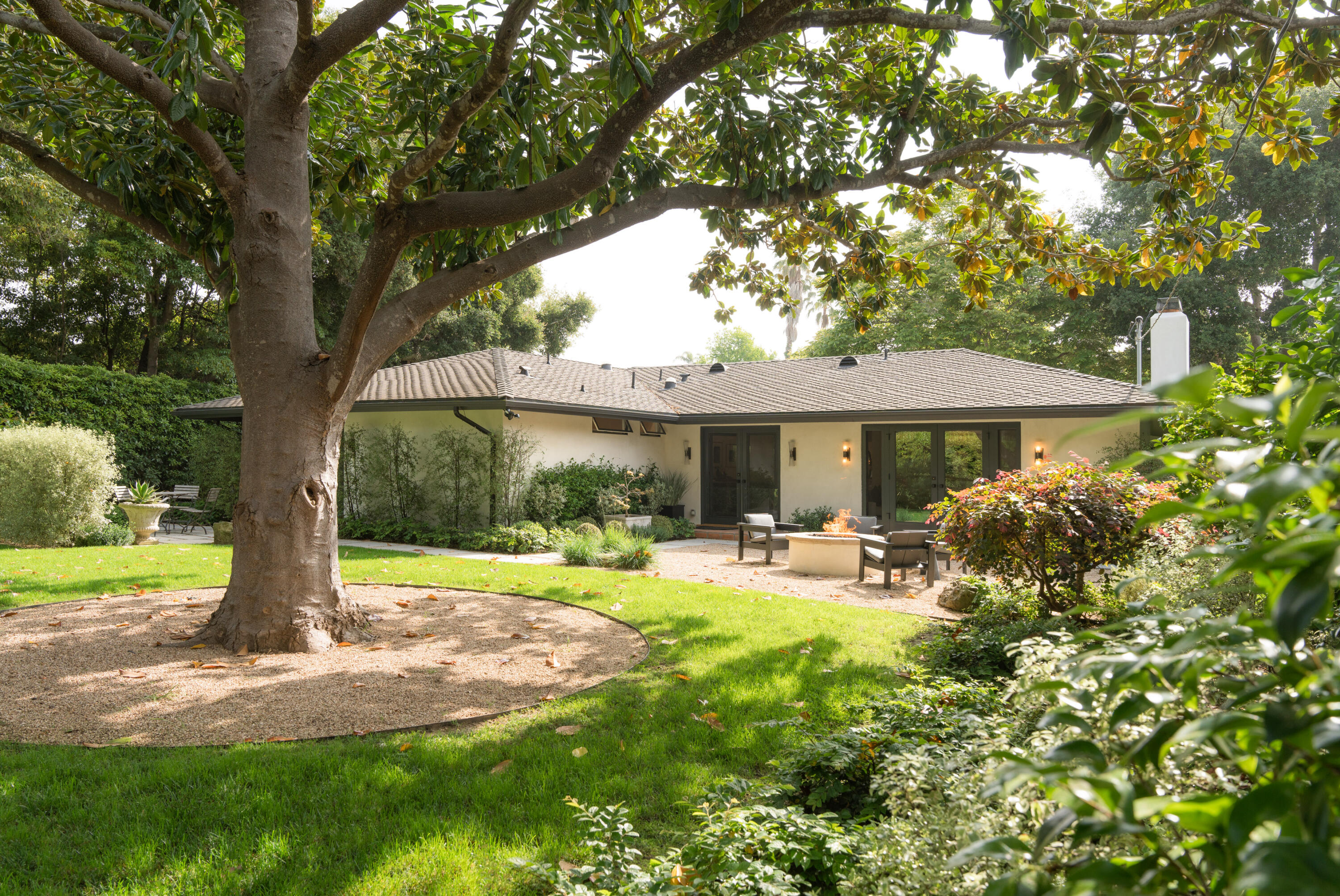 135 Pomar Lane Montecito, CA 93108 - Photo 23 of 29 a front view of a house with yard and green space