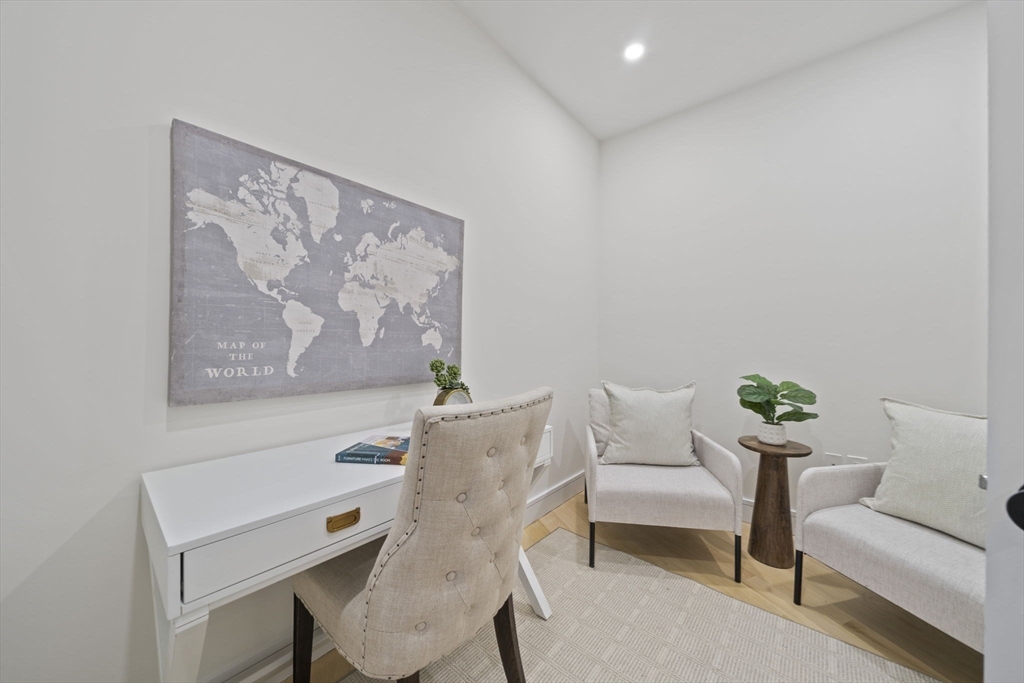 293 Cross Street Norwell, MA 02061 - Photo 17 of 42 a living room with furniture and a table