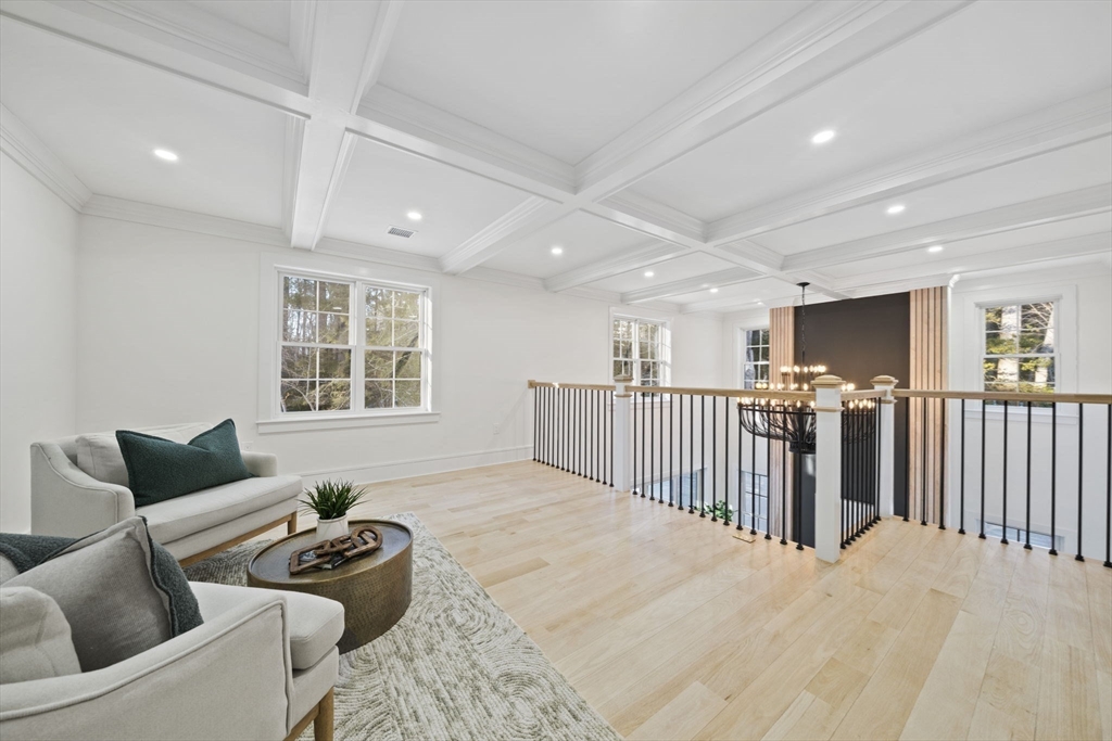 293 Cross Street Norwell, MA 02061 - Photo 20 of 42 a living room with furniture and a window