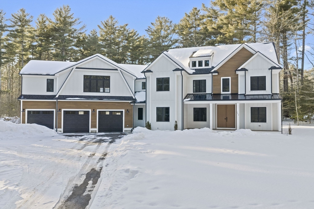 293 Cross Street Norwell, MA 02061 - Photo 2 of 42 a front view of a house with a yard