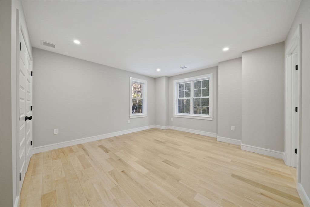 293 Cross Street Norwell, MA 02061 - Photo 21 of 42 a view of an empty room with a window