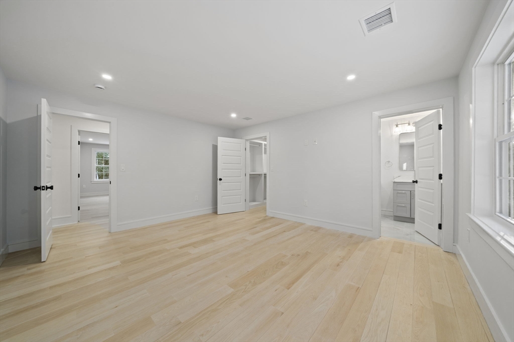 293 Cross Street Norwell, MA 02061 - Photo 25 of 42 a view of empty room with wooden floor