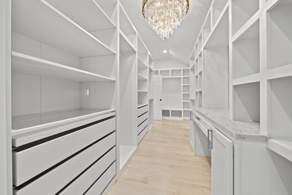 293 Cross Street Norwell, MA 02061 - Photo 29 of 42 a view of a hallway with wooden floor and staircase