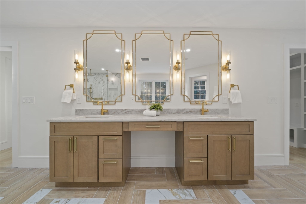 293 Cross Street Norwell, MA 02061 - Photo 33 of 42 a bathroom with a double vanity sink and a mirror