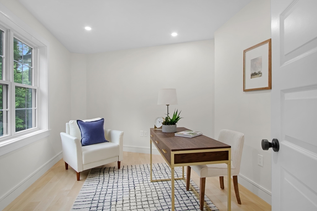 293 Cross Street Norwell, MA 02061 - Photo 34 of 42 a living room with furniture and a window