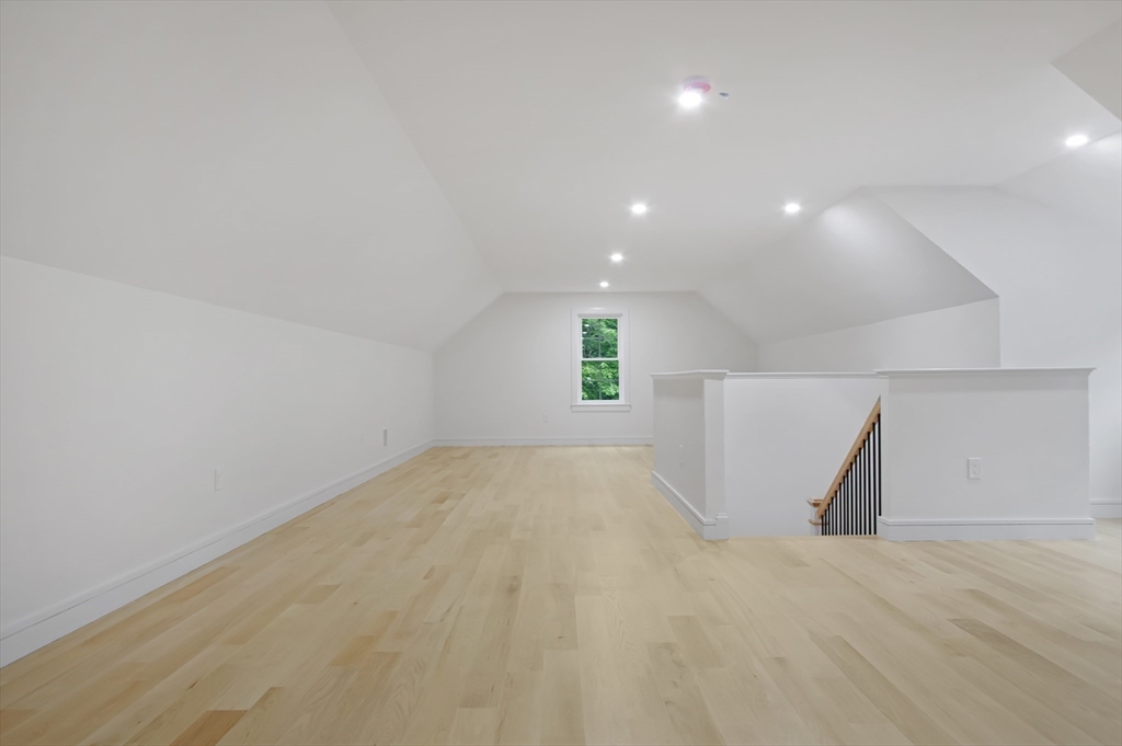 293 Cross Street Norwell, MA 02061 - Photo 35 of 42 an empty room with a window and a ceiling fan