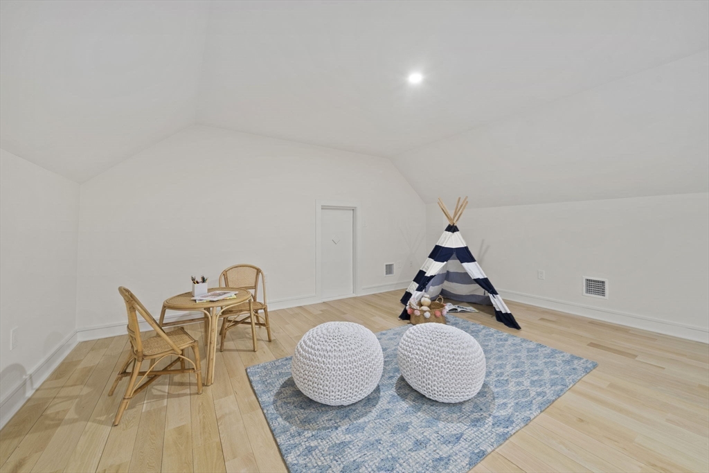 293 Cross Street Norwell, MA 02061 - Photo 36 of 42 a living room with furniture and a table