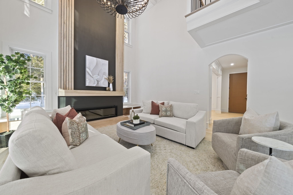 293 Cross Street Norwell, MA 02061 - Photo 9 of 42 a living room with furniture and a potted plant