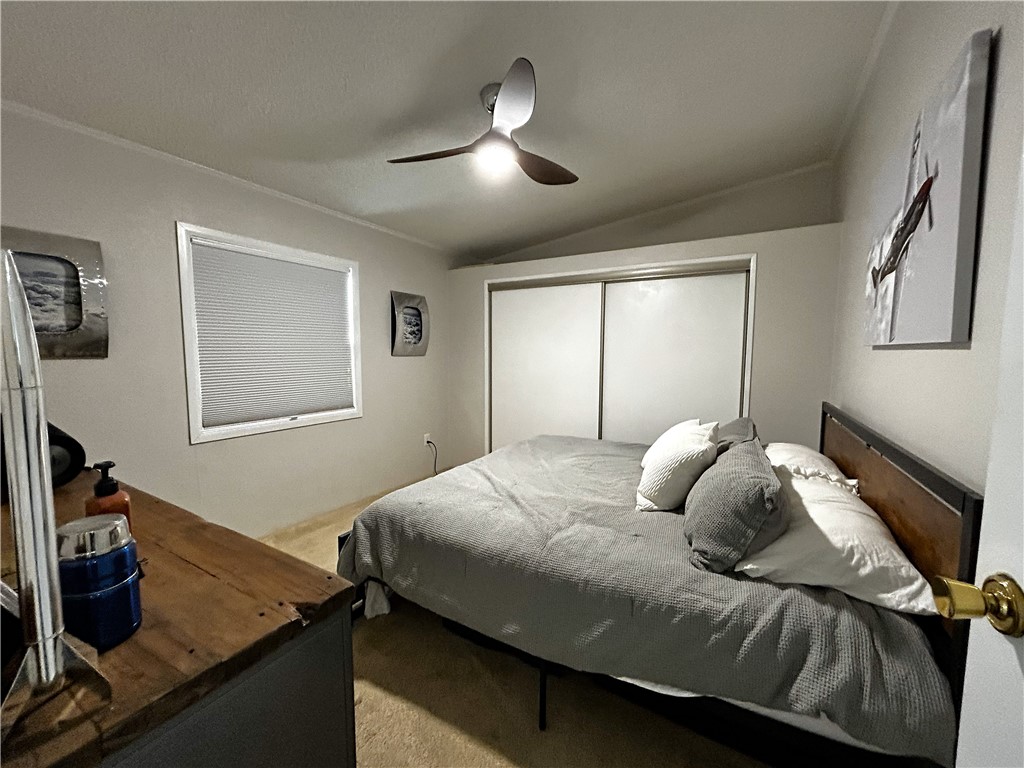 196 Thunderhead 2 Needles, CA 92363 - Photo 11 of 15 a bedroom with a bed and a window