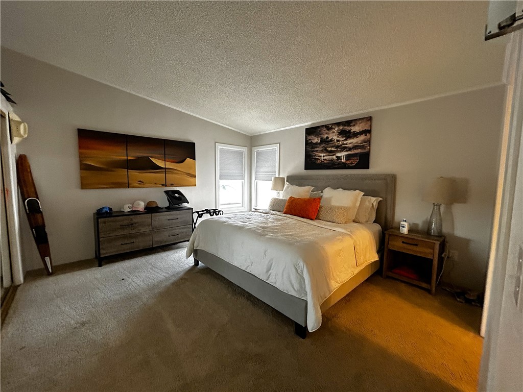 196 Thunderhead 2 Needles, CA 92363 - Photo 12 of 15 a bedroom with a bed and a television