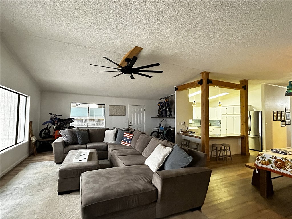 196 Thunderhead 2 Needles, CA 92363 - Photo 4 of 15 a living room with furniture and a large window