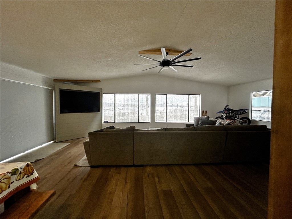 196 Thunderhead 2 Needles, CA 92363 - Photo 8 of 15 a living room with couches and flat screen tv