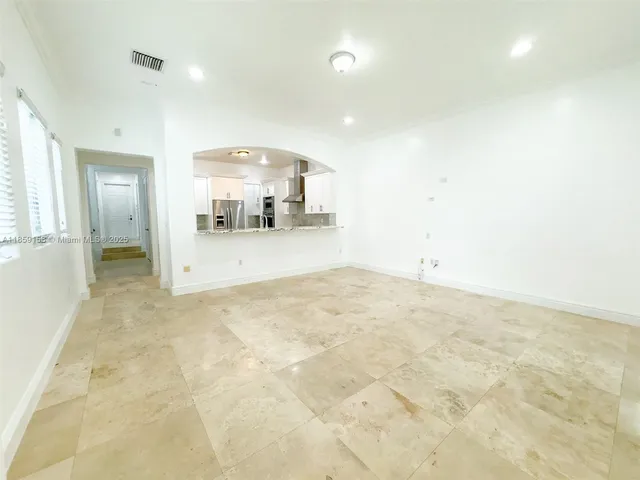 an empty room with a natural light