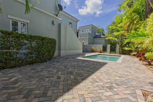 a bathroom with a sink toilet and a mirror