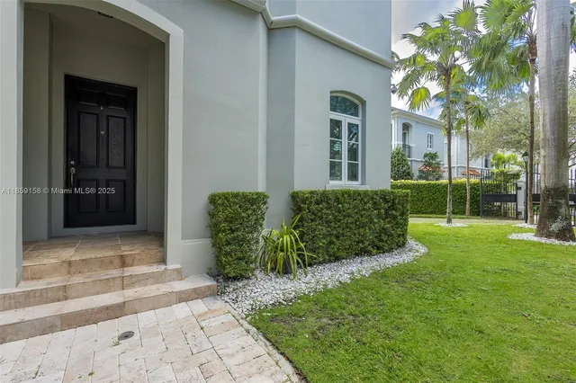 a view of a back yard of a house