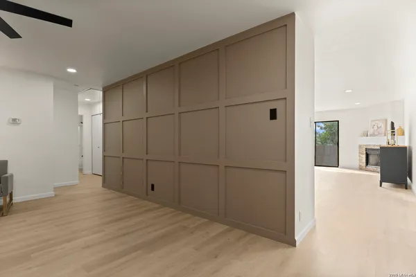 a view of a livingroom with wooden floor
