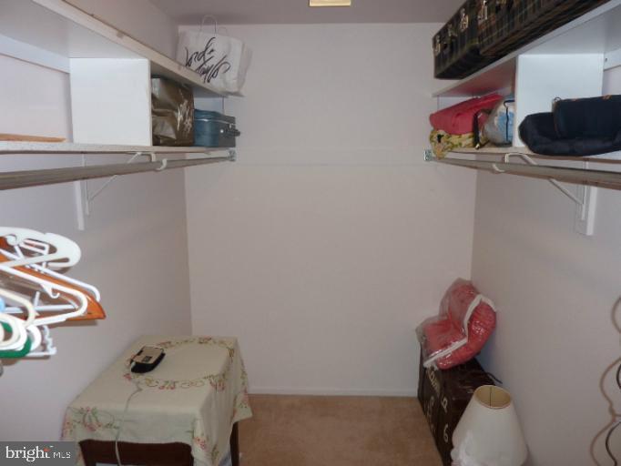 2903 Fallstaff Road, Unit 503 Baltimore, MD 21209 - Photo 16 of 20 a bathroom with a toilet sink and vanity